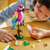 Person shown building the LEGO® Creator Exotic Pink Parrot 31144 Building Toy Set (253 Pieces)