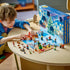 Child building the LEGO® City 2023 Advent Calendar 258 Piece Building Set (60381)