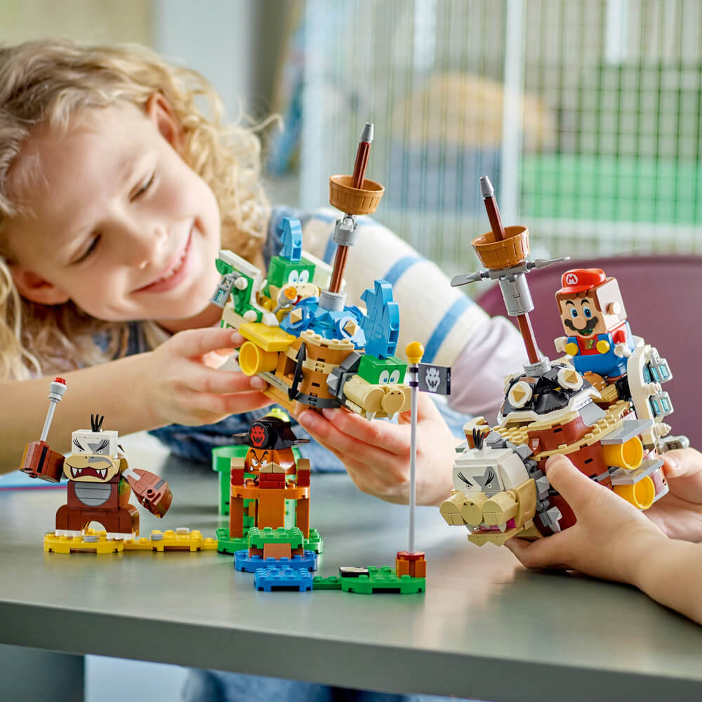 Children playing with the LEGO® Super Mario™ Larry’s and Morton’s Airships Expansion Set 71427 (1,062 Pieces)