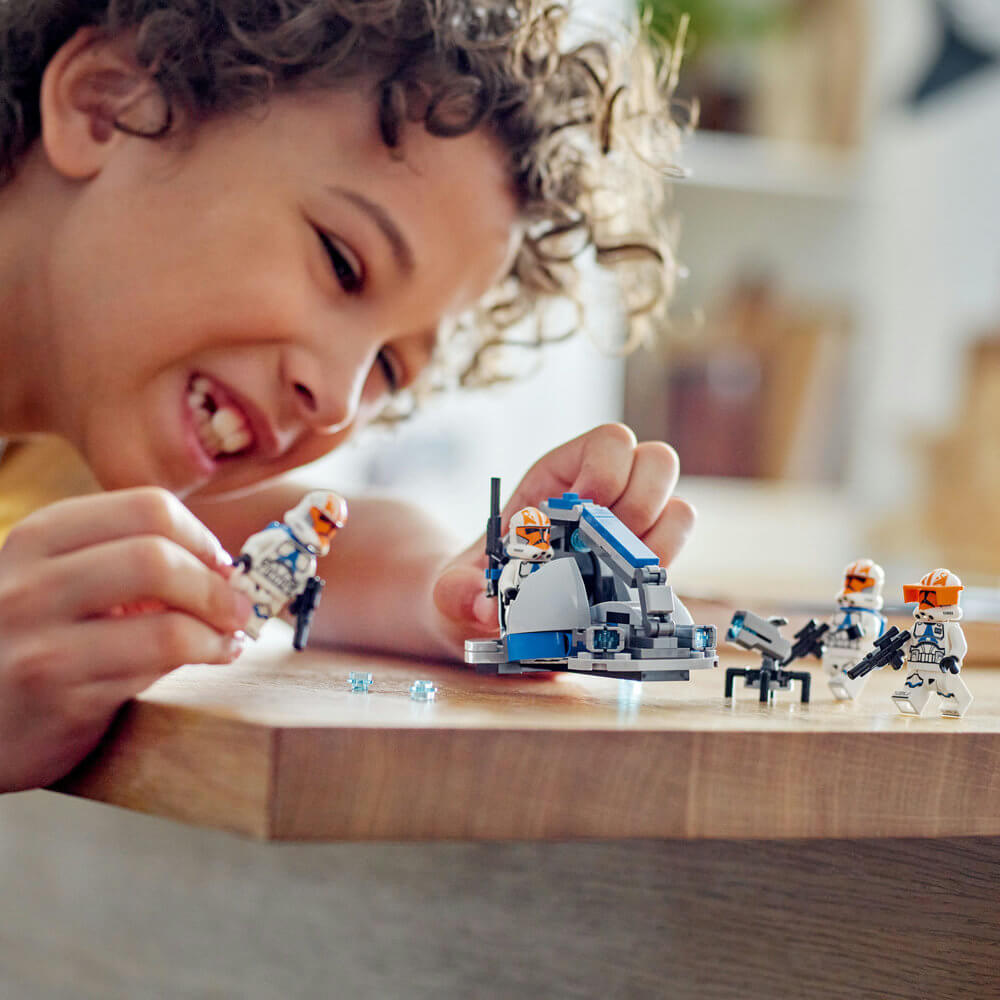 Child shown playing with the LEGO® Star Wars™ 332nd Ahsoka’s Clone Trooper™ Battle Pack 75359 (108 Pieces)