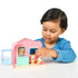 Boy playing with the Bluey Ice Cream Shop Mini Playset and Bingo figure