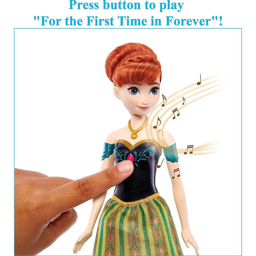 Finger pressing Disney Frozen Singing Anna Doll making her sing for the first time in forever