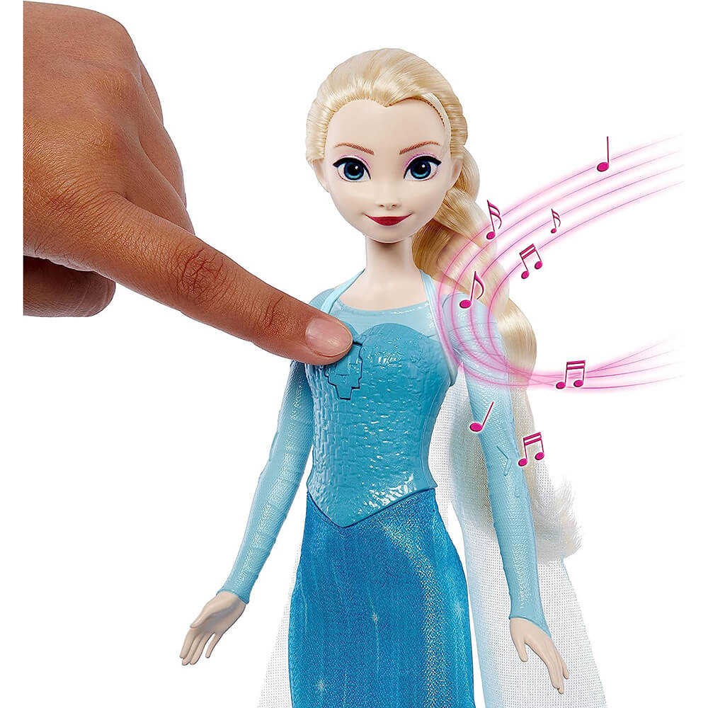 Finger pressing the Disney Frozen Singing Elsa Doll making her sing