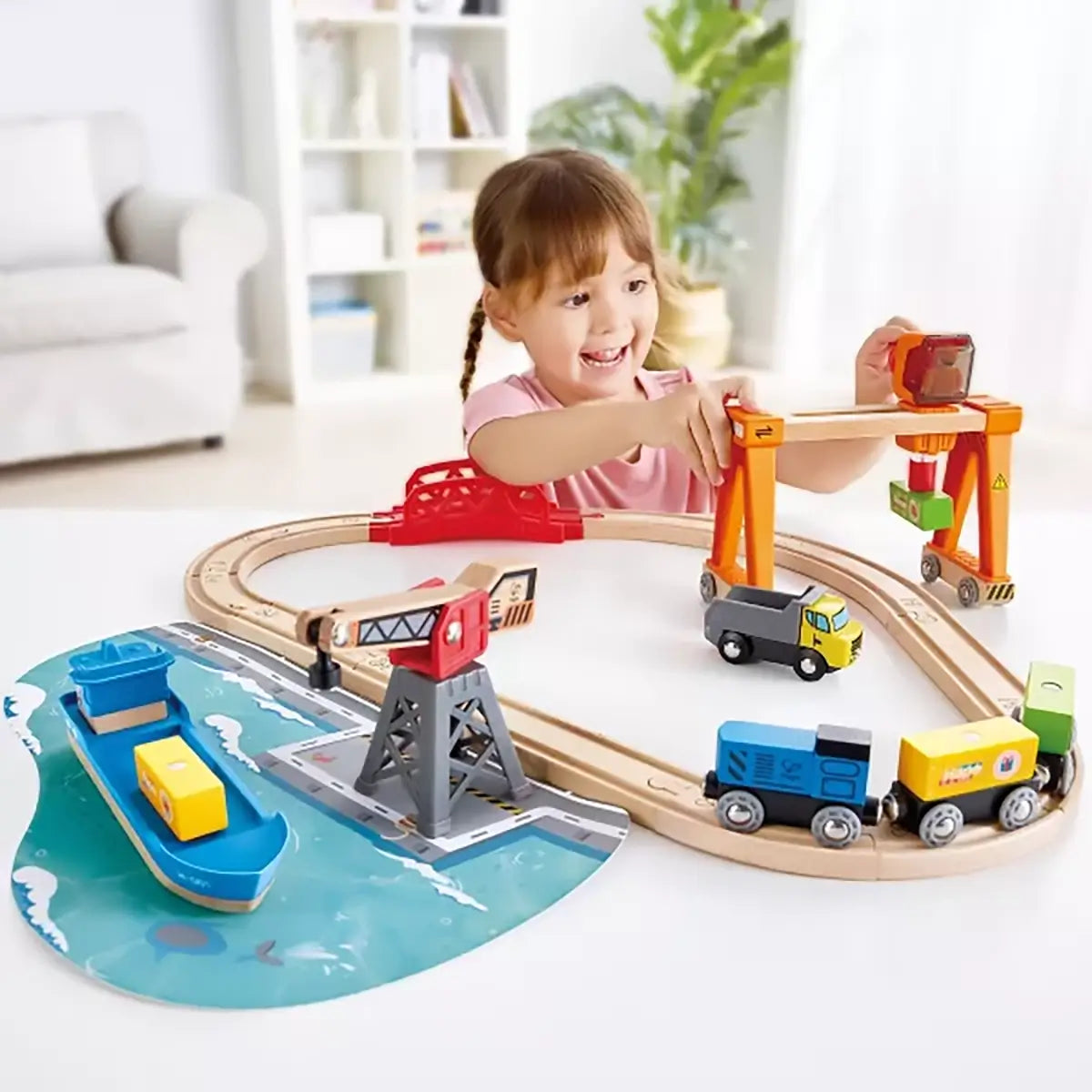 Hape Railway Lift and Load Harbor Set child playing