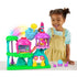 Girl playing with the Imaginext DreamWorks Trolls Lights & Sounds Rainbow Treehouse