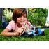 Child playing with Jurassic World Search 'n Smash Truck Playset