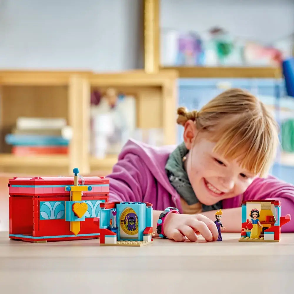 Another image of girl playing LEGO® Disney Princess Snow White's Jewelry Box