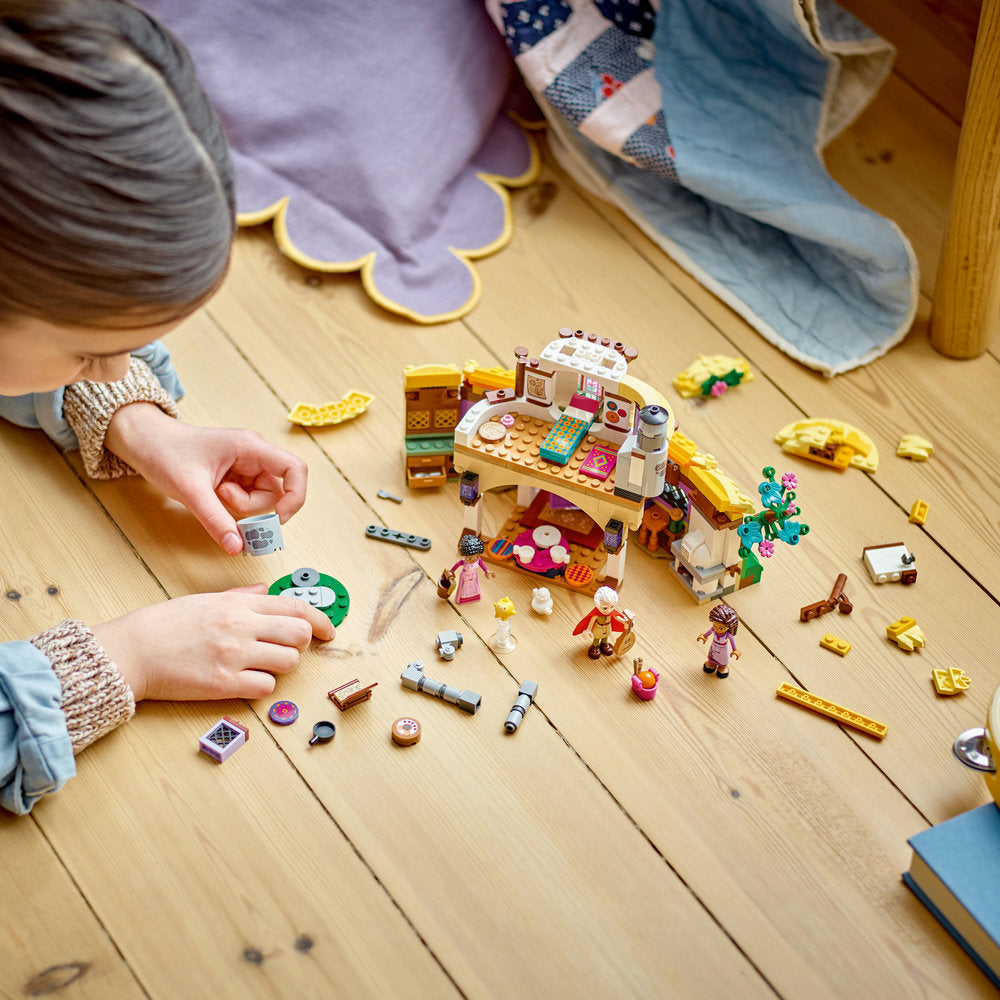 Girl playing Lego Disney Princess Wish Ashas 