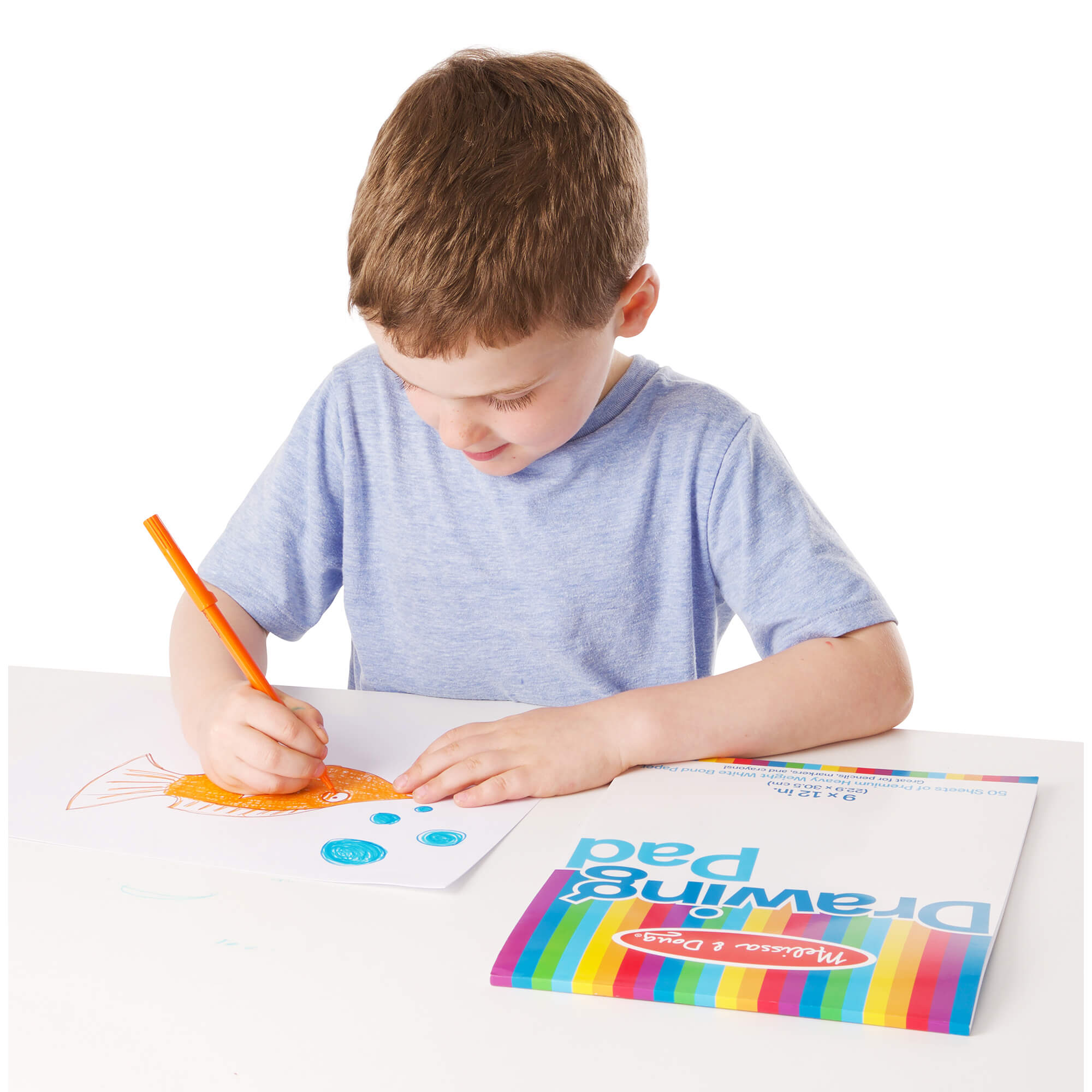 Melissa and Doug 9 x 12" Drawing Paper Pad with child drawing a fish