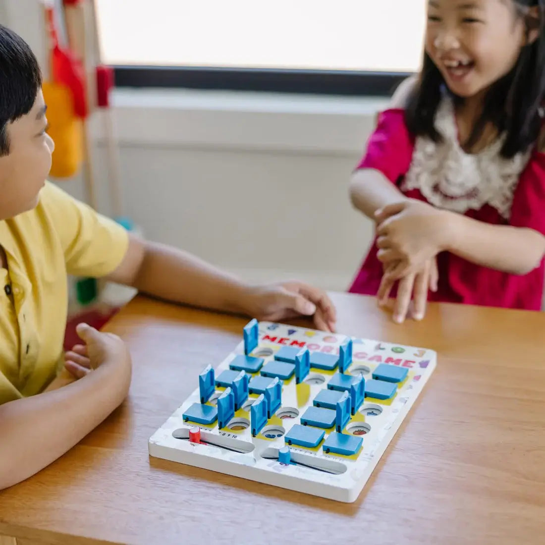 children playing the Melissa and Doug Flip-to-Win Memory Game