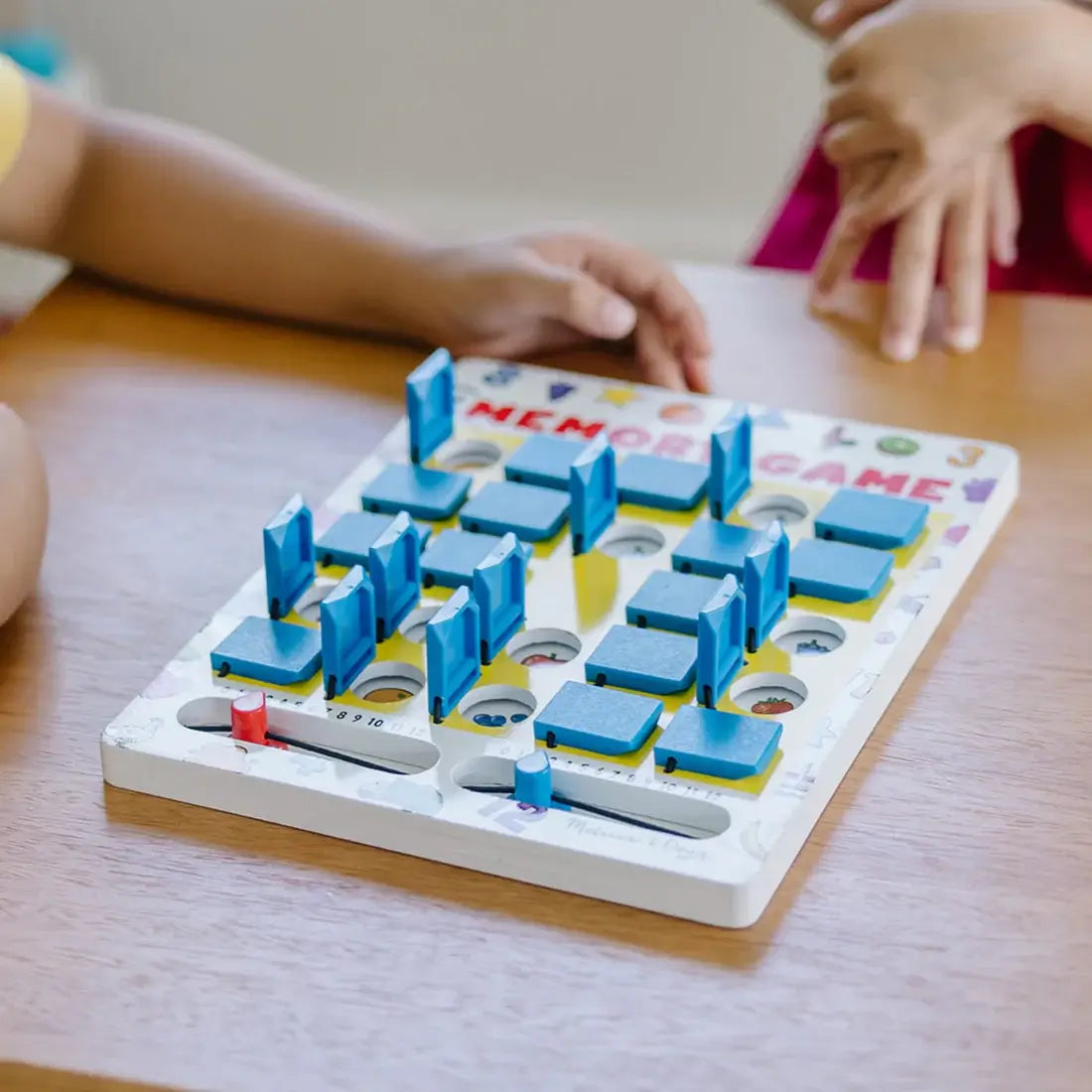 board shown with the windows open on the Melissa and Doug Flip-to-Win Memory Game