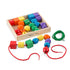 Melissa and Doug Primary Lacing Beads Set shown with packaging and two ropes removed. One of the ropes is filled with lacing beads