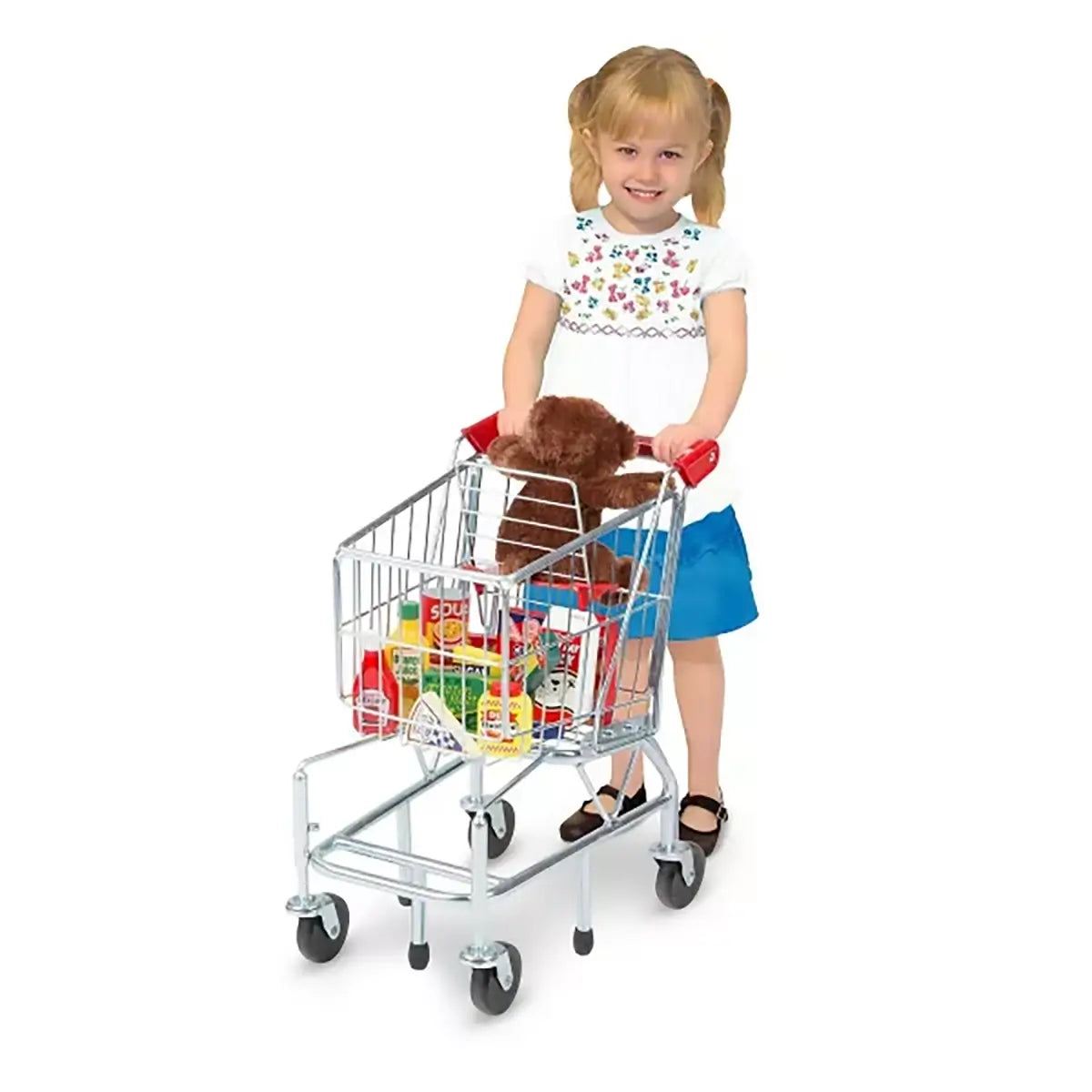 Girl pushing Melissa and Doug Shopping Cart