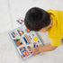 Boy wearing yellow shirt playing the vehicle puzzle