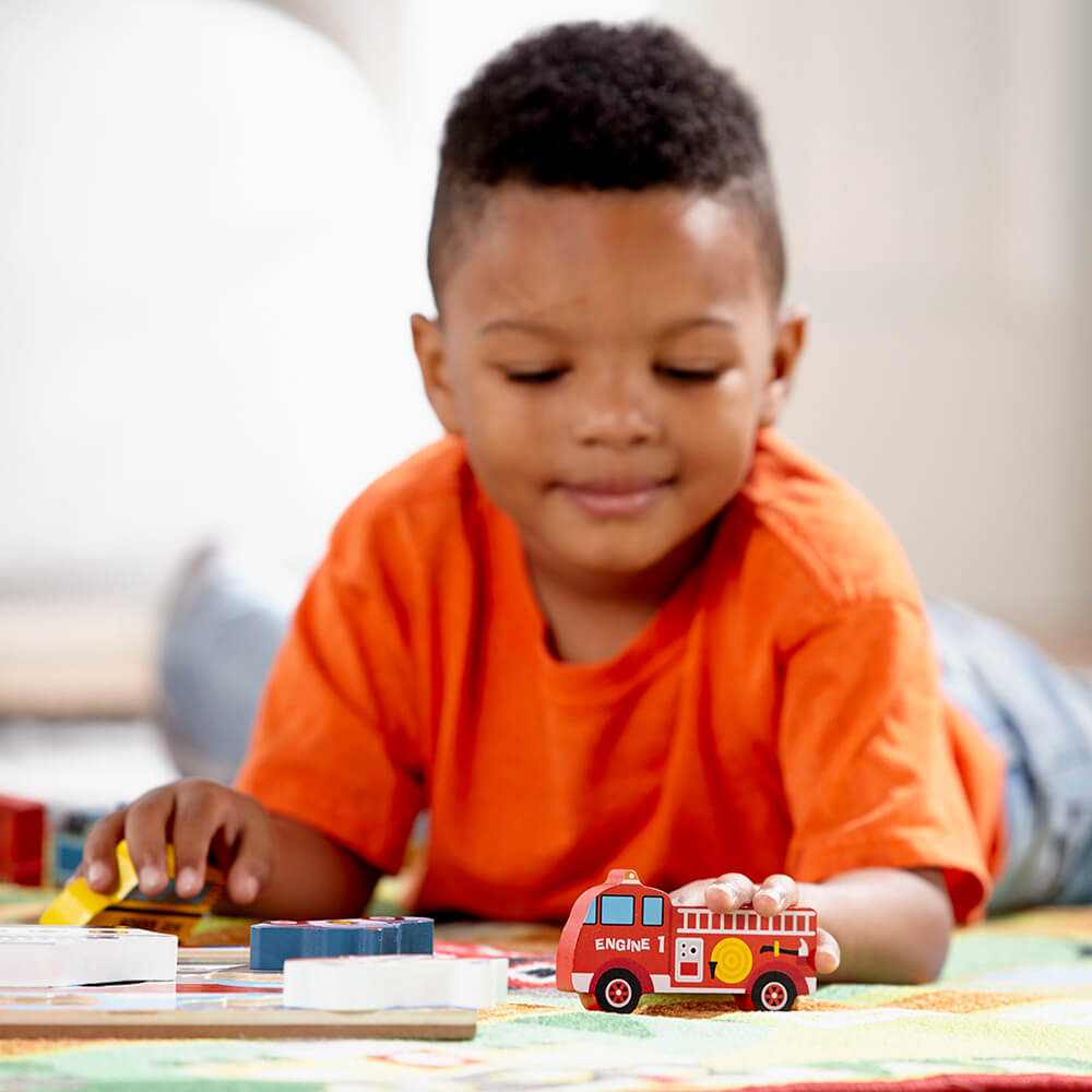 Melissa and Doug Vehicles 9 Piece Chunky Puzzle Boy Playing