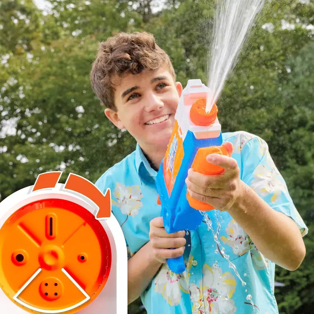 Boy firing water with his super soaker