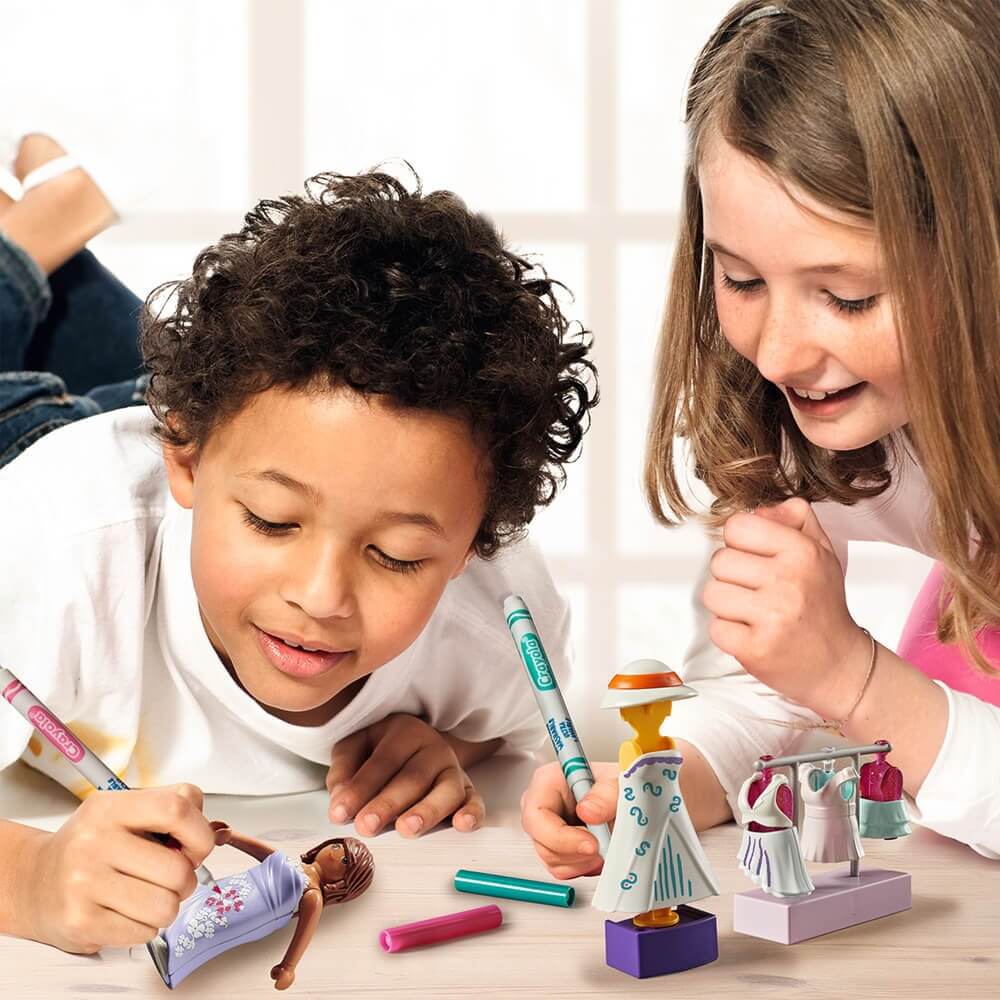 boy and girl playing the PLAYMOBIL Color Dressing Room