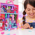 Girl playing with the Polly Pocket Stylin' Safari Fashion Collection Playset