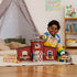 Boy playing with the Schleich Farm World Large Barn with Animals and Accessories Set