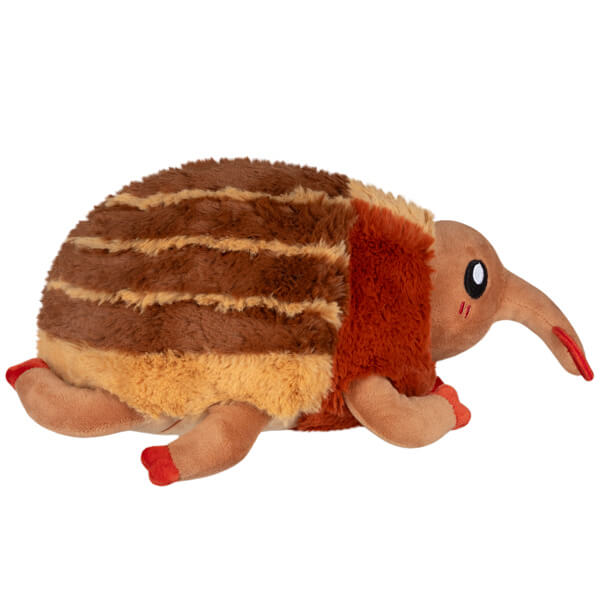 Side view of the Squishable Mini Weevil Plush, showing off it's brown and orange colors.