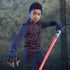 Boy posing with the Star Wars Lightsaber Forge Darth Maul Extendable Red Lightsaber