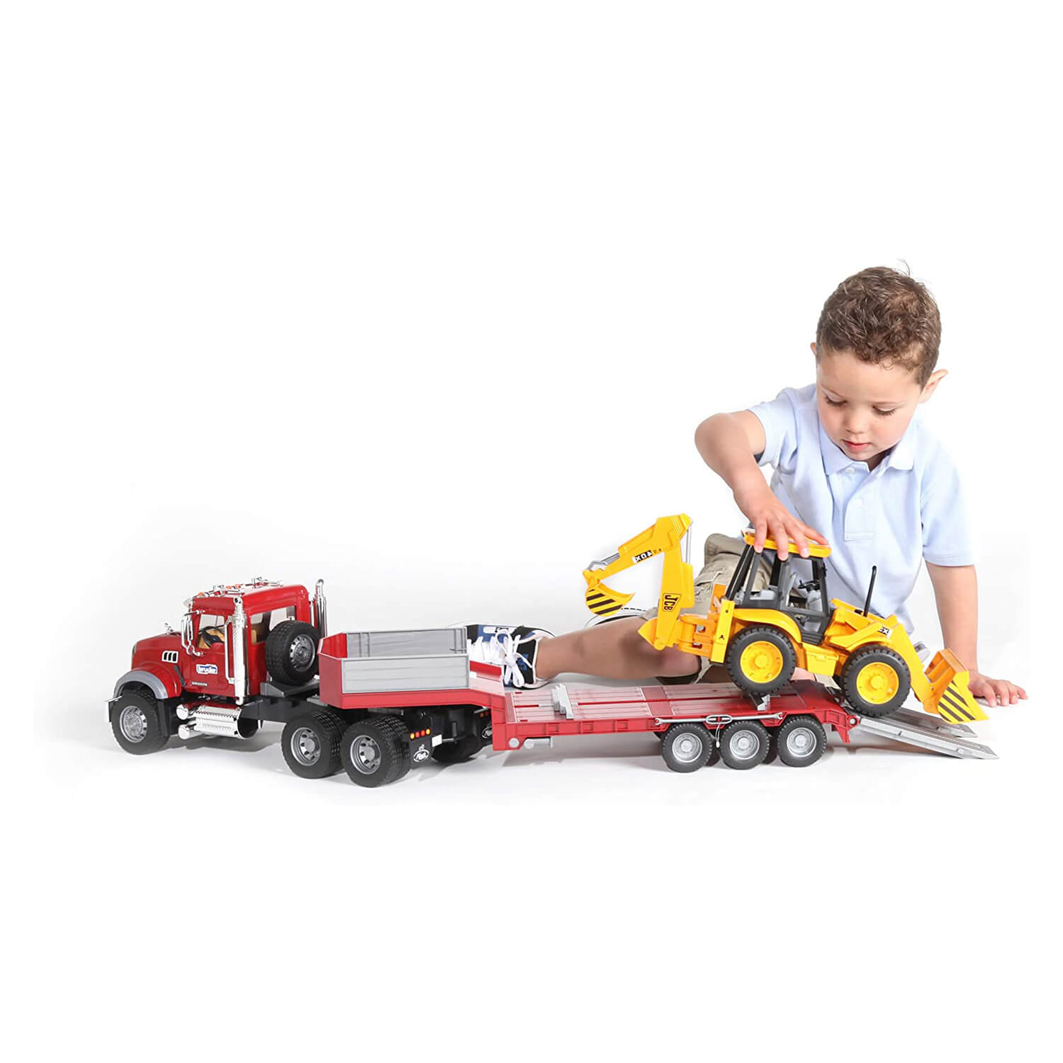 Kid playing with the granite flatbed truck.