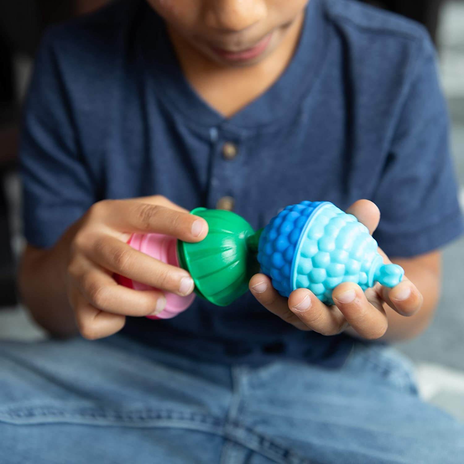 Kid playing with the toy.