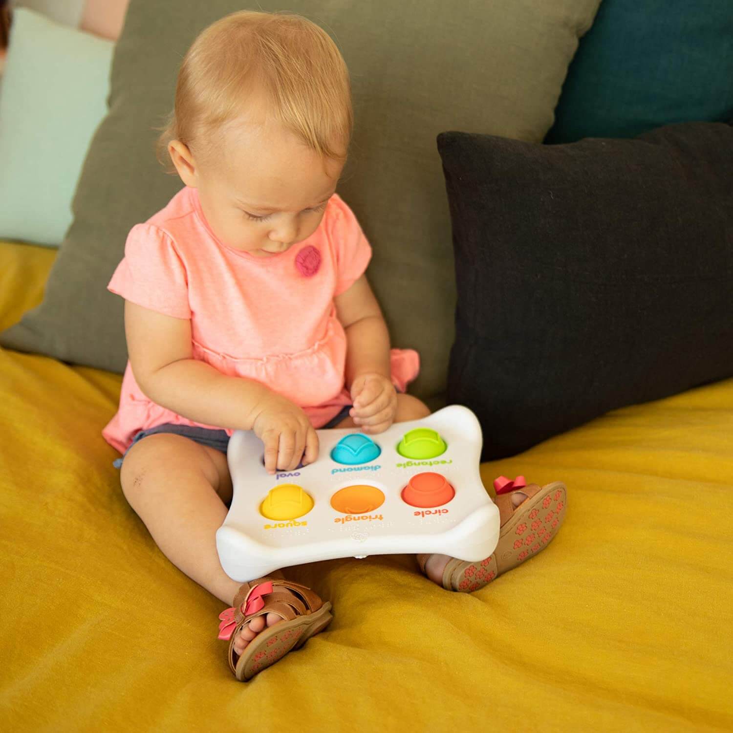 Baby playing with the toy.