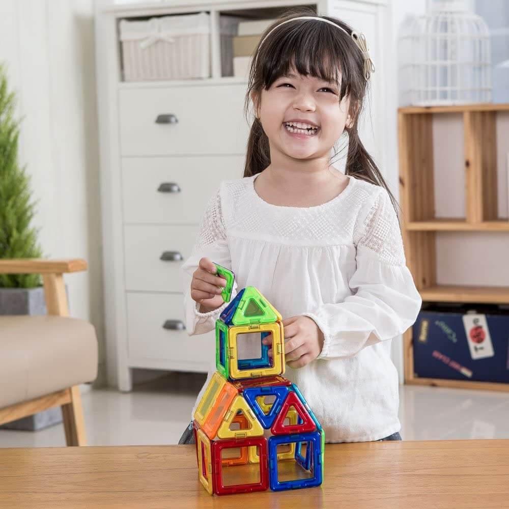 Front view of kid playing with the toy.